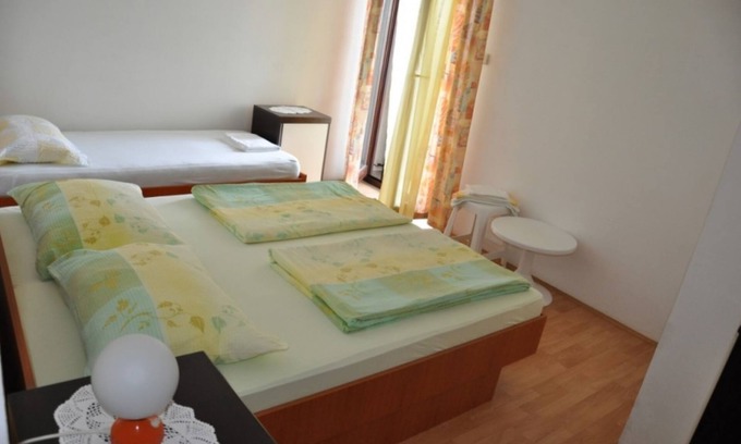 Lopar Apartment | One bedroom apartment with balcony and sea view Lopar, Rab (A-23747-d)