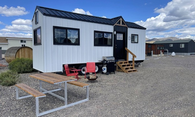 Meeker House | Our newest and one of our largest tiny homes contains a queen bed on the main level and two queen lofted beds. Sleeps: 6
