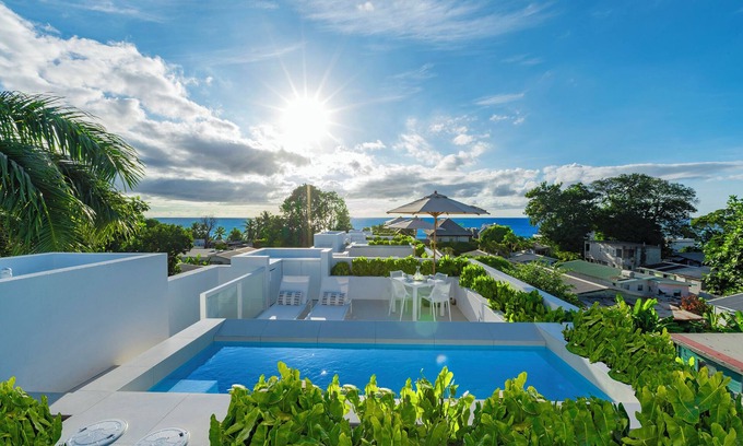 Mount Standfast Hotel | Palm Grove Villas & Hotel