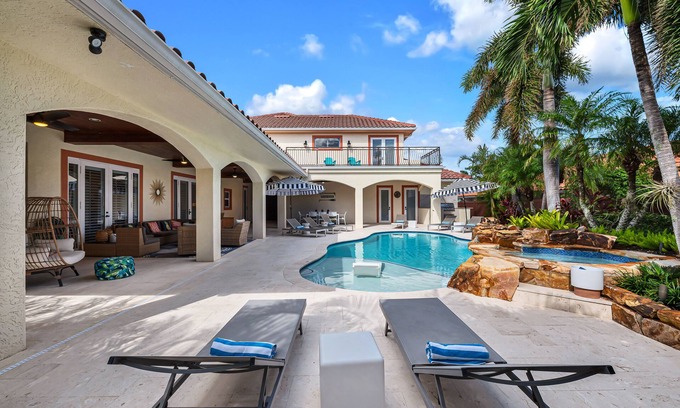 Naples Park House | Paradise Palm Villa- SEE OUR NEW POOL AREA AND OUTDOOR KITCHEN!