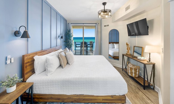 Panama City Beach Condo | PCB condo with gulf views, pools, hot tub, tiki bar and more! small dog ok