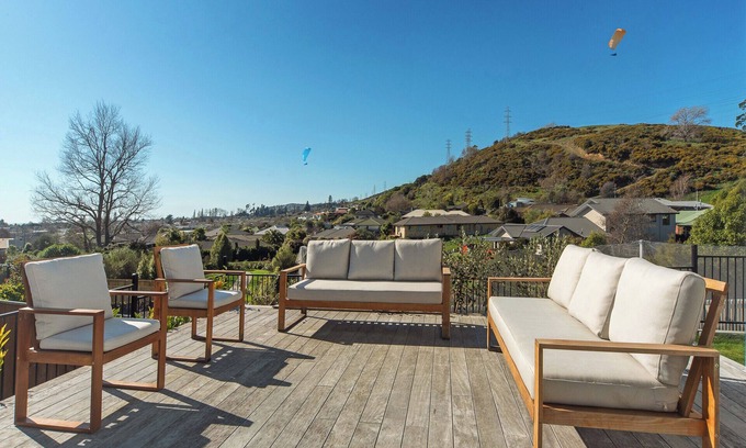 Stoke House | Peaceful Piwakawaka - Elegant Escape with Spacious Deck and Serene Surroundings
