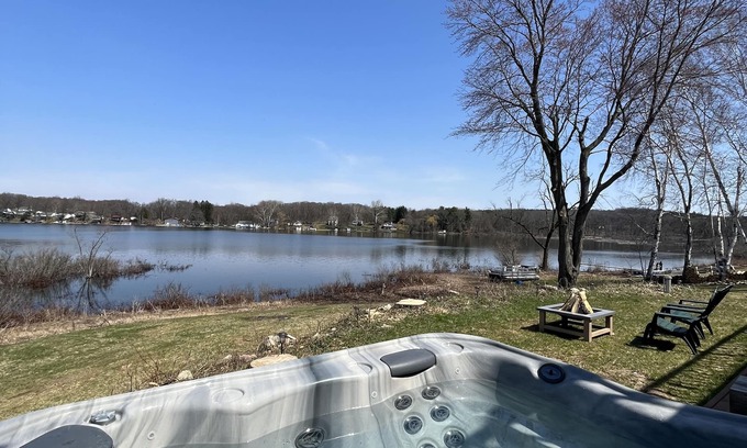 Delton House | Peaceful & Private Lakefront House on Shelp Lake, hot tub is open year round