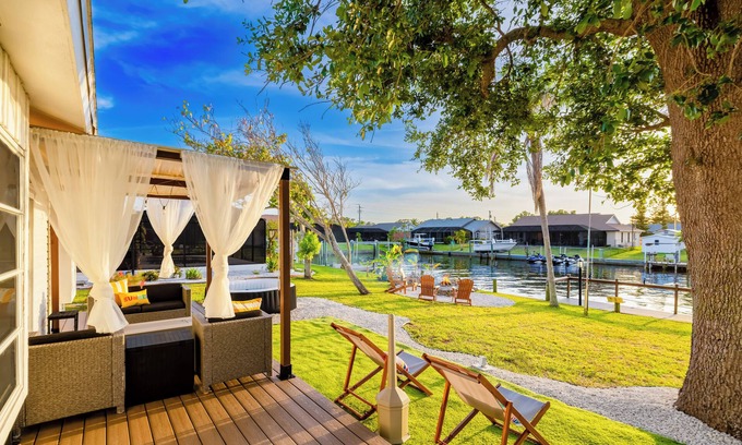 Gulf Cove House | Pelican Lakefront Villa with Sunset Deck, Private Hot Tub, Games and BBQ