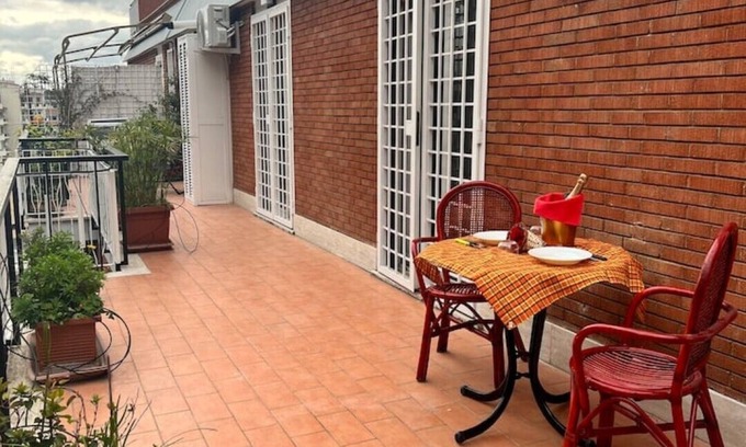 Tuscolano Apartment | Penthouse with terrace in Central Metro An area