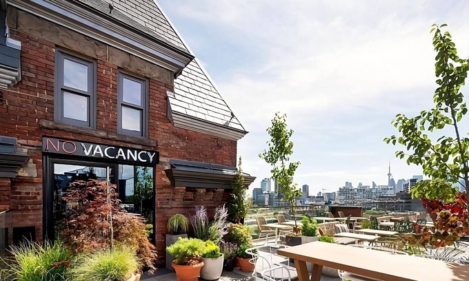 Riverside Hotel | Pet-Friendly Boutique Property in East End! On-Site Coffeehouse, Rooftop Bar