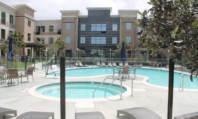 Bressi Ranch Apartment | Pool & Hot Tub! Free Breakfast Buffet Included When You Stay Here!