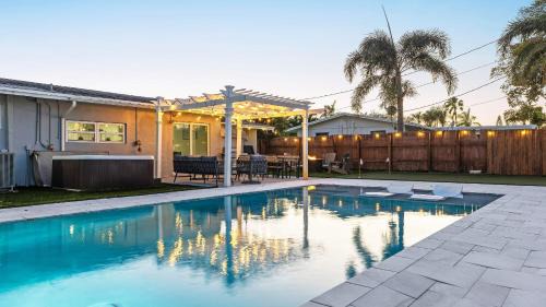Deerfield Beach House | Pool Hot Tub Putting Green near Deerfield Beach Oasis on Fourth by AvantStay