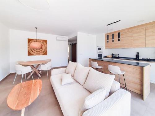 Santiago de la Ribera Apartment | Private jacuzzi, 50m from the sea, pool,AC,parking