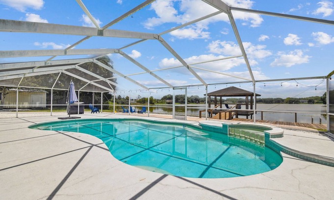 Westchase House | Private Lakefront Retreat with Heated Pool, Dock & Kayaks Near Tampa