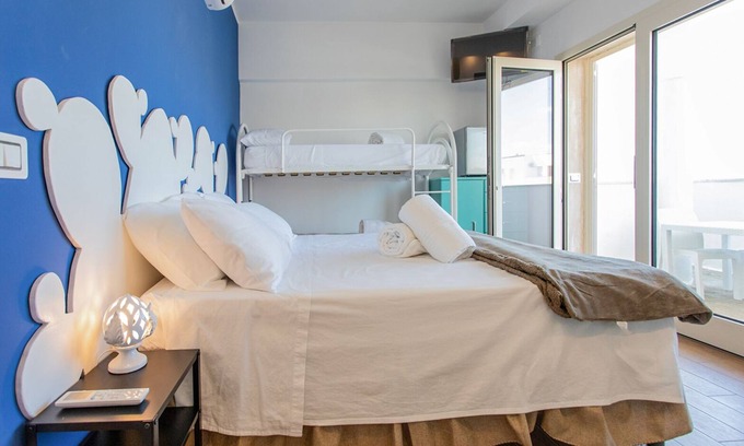 Gallipoli Villa | Quadruple Room at Center House Gallipoli, by Apulia Home