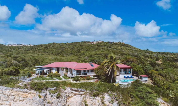 Freetown Villa | Raw And Rustic Waterfront Retreat. One Of A Kind Home In A Unique Location