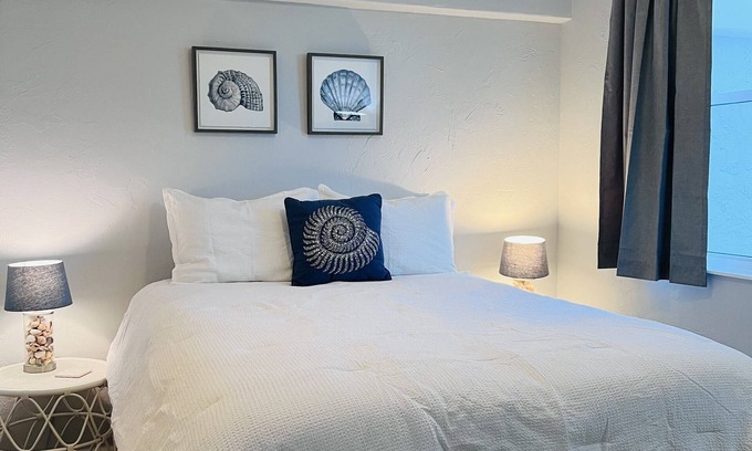 Jacksonville Condo | Relax and enjoy the ocean view on the balcony. Just 15 minutes to Mayo Clinic