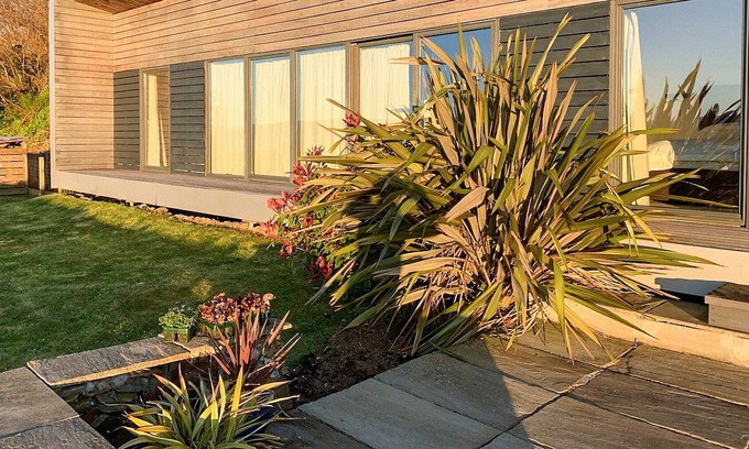 Breakish Cottage | Relax by the wood burner and look out across the sound of Sleat and beyond planning the next day’s a