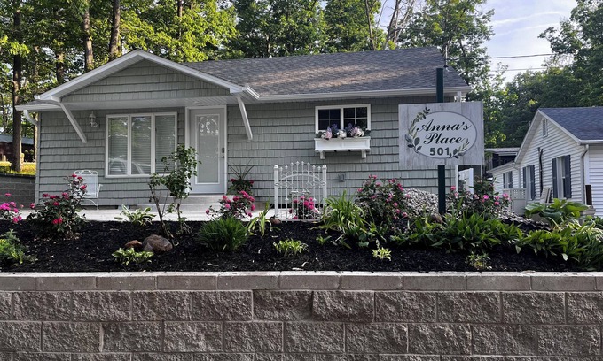 Harrison Cottage | Relax & Unwind at Anna's Place! Stylish interior, gardens + a beautiful patio.