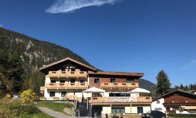 Biberwier Apartment | Relax wonderfully, and into an apartment with a view of the slopes/mountains.