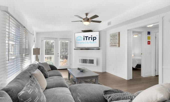 Bayside Park House | Renovated canal-front pet-friendly home with a fireplace and boat dock, steps away from the marina!