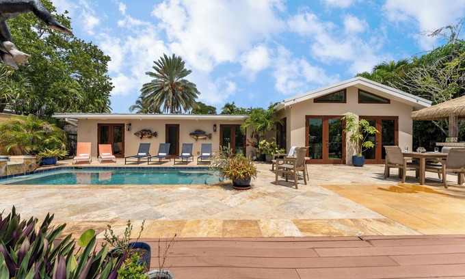 New Town House | RISE AND SHINE ~ Canal Front 3 BR/3Ba Home w/Heated Pool!