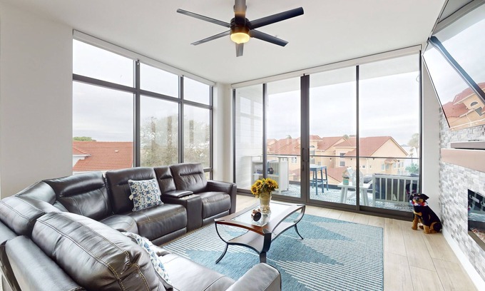 Melbourne Beach Condo | River view retreat with on-site pool, hot tub, & dock plus washer/dryer, & AC