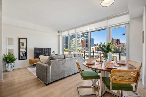 Downtown Calgary Apartment | Riverside Retreat - Enjoy Walking Trails, FREE Banff Pass, Gym, Wine & Parking! Work Space Included!