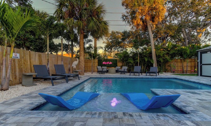 Indian Rocks Beach Cottage | Rockin Retreat- Triplex w/heated pool, Steps to beach, fire pitt, and putt putt