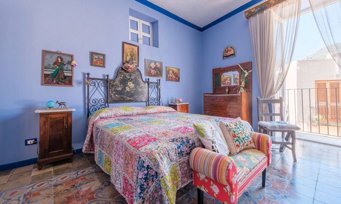 Lipari Historic Centre Apartment | Room 'Blu' with Shared Terrace, Wi-Fi and Air Conditioning
