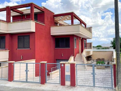 Tuglie House | Rosso Porpora