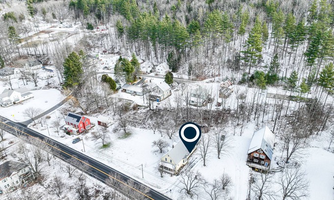 Rochester House | Rural mountain-view home near skiing with screened porch, firepit, & game room