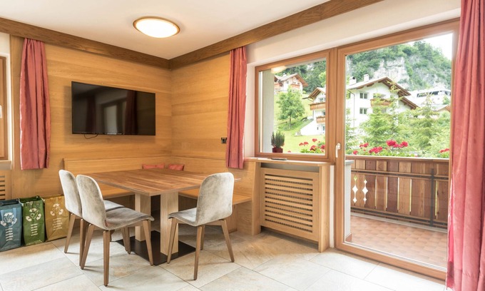 Santa Cristina Val Gardena Apartment | Rustic Apartment "Emil" with Balcony, Mountain View, Garden & Wi-Fi