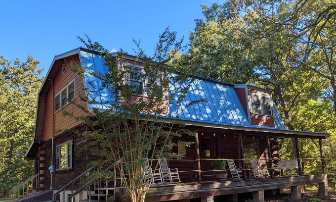 Blossom House | Rustic log cabin in 20 acres of woods.