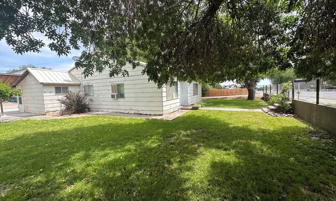 Maeser House | Rustic nice home in Vernal UT 2 bedrooms with queen beds 1 full bathroom.
