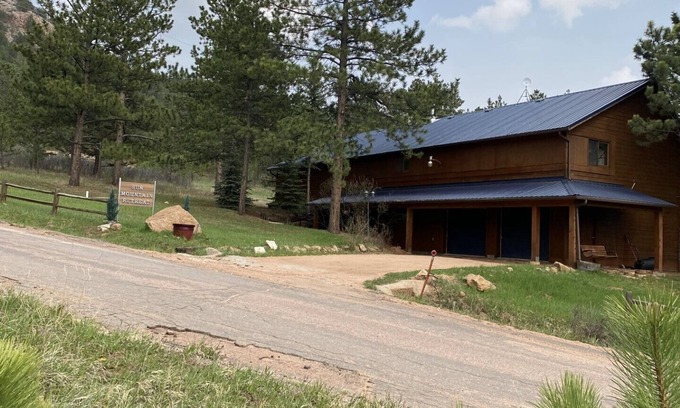 Woodland Park House | Rustic retreat -So much fun - log playground, hot tub, concrete game court