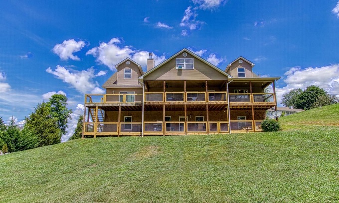 Sevierville Cabin | Rustic River Lodge by HoneyBearCabins
