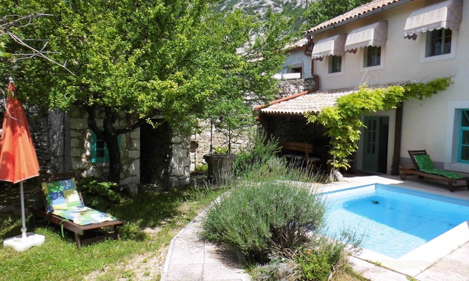 Drivenik House | Rustic stone house with pool