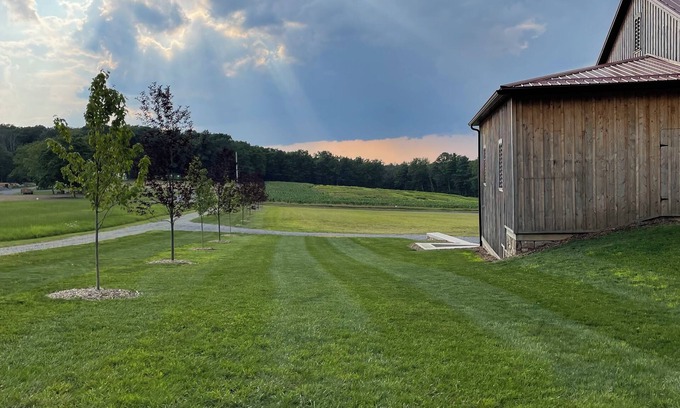 Antes Fort House | RV lot Hook Up, 5 minutes off I 80. Peacefully hidden behind our vintage barn.