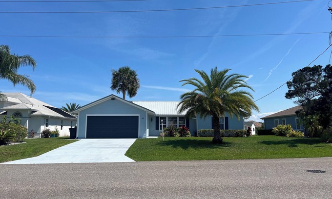 Palm Harbor House | Salty Waterways Escape with a dock. Family friendly, boat rental available