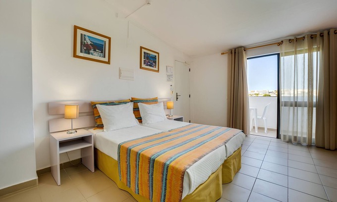 Albufeira Hotel | Scenic Albufeira Retreat | Steps from Beaches & Lively Nightlife Spots