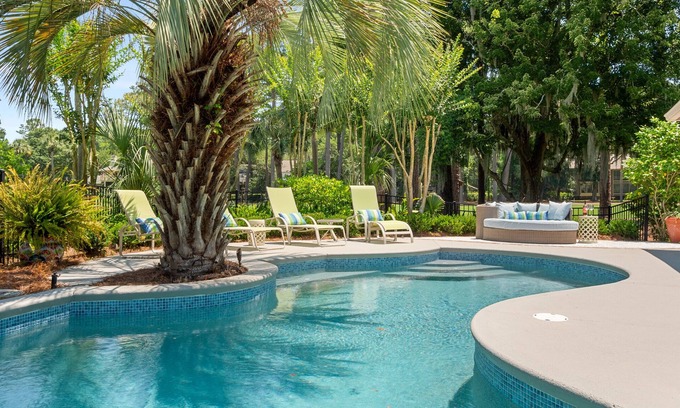 Heritage Woods House | Sea Pines home overlooking the Harbour Town golf course, surrounded by lagoon