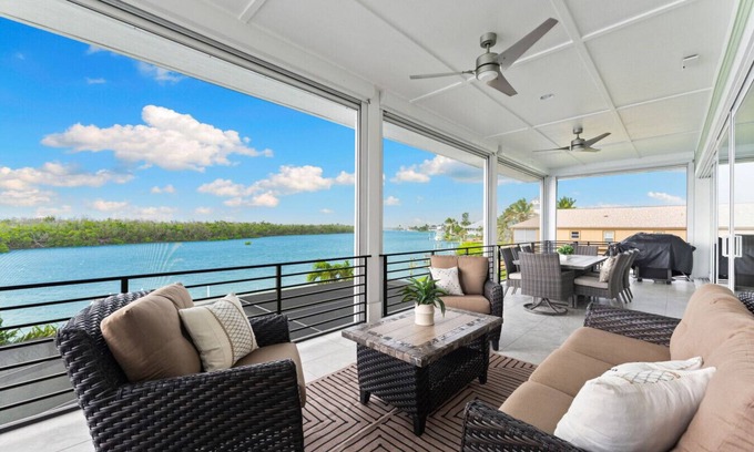 Bonita Springs House | Seafoam Serenity - Bayfront Retreat w/Dock, Pool & 1 Min Walk to Bonita Beach