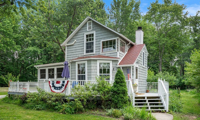 Fennville Cottage | Secluded lakefront cottage with sweeping views, huge deck, washer/dryer, & WiFi