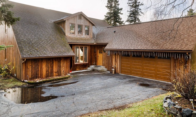 Rabbit Creek House | Secluded retreat with lush sunroom, scenic deck, fireplace & W/D