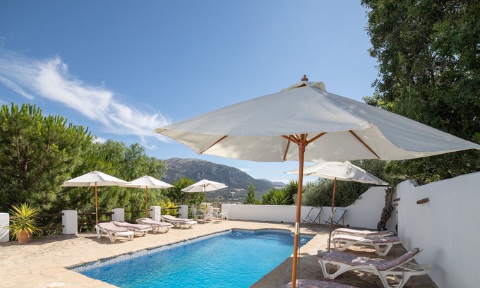 Villanueva del Trabuco Apartment | Secret garden rock pool retreat vacation home with shared pool and WiFi