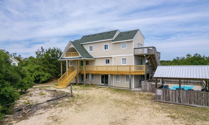 Carova Beach House | See the wild horses from your spacious 8-bedroom home in the 4x4 Carova Beach