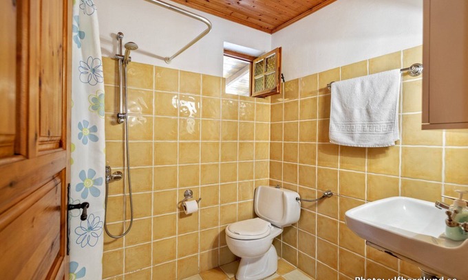 Vasilikos Cottage | Self catered cottage with large veranda and garden with hammock near the beach.