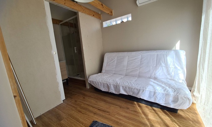 Corneilla-del-Vercol Apartment | Self-contained accommodation with trees, terrace and outdoor area close to the beach.