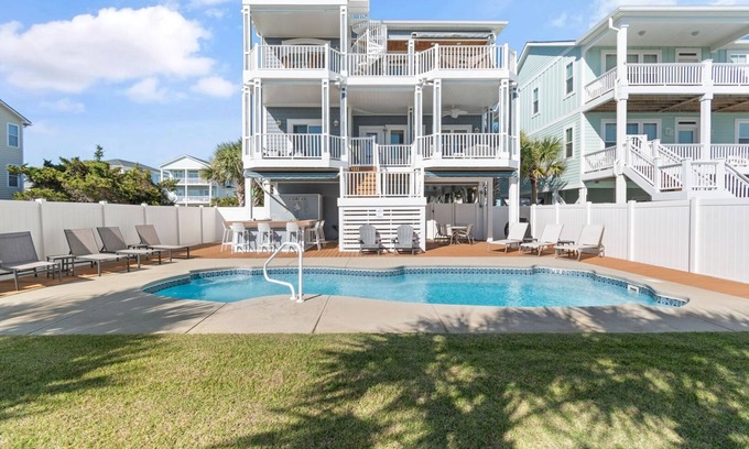 Holden Beach House | "Shrimply The Best" is better than all the rest! This gorgeous property features 5 Bedrooms, 5.5 Bathrooms, private Saltwater pool, Tiki Bar, and Elevator.