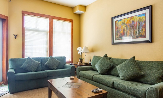 Salt Lake Mountain Resorts Condo | Solitude Resort ski in/out. 1 bedroom + den. Eagle Springs East #103. Sleeps 5.