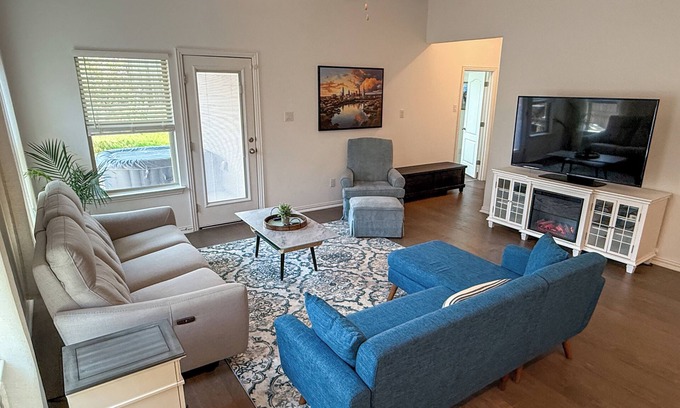 Buda House | Spacious 4BR Escape with Hot Tub, Laundry, and Pools in Buda.