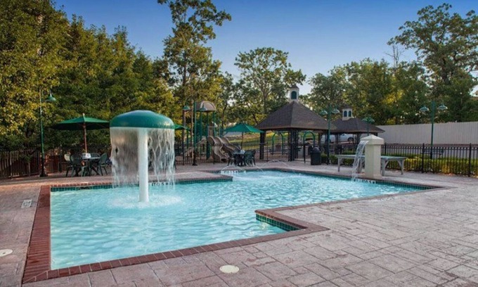 Branson Hotel | Spacious Bedroom w/Balcony, Full Kitchen + Kid-Friendly Play Area