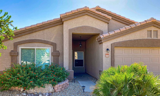 Canyon Ridge West House | Spacious desert home with hot tub, covered patio, grill, & modern finishes